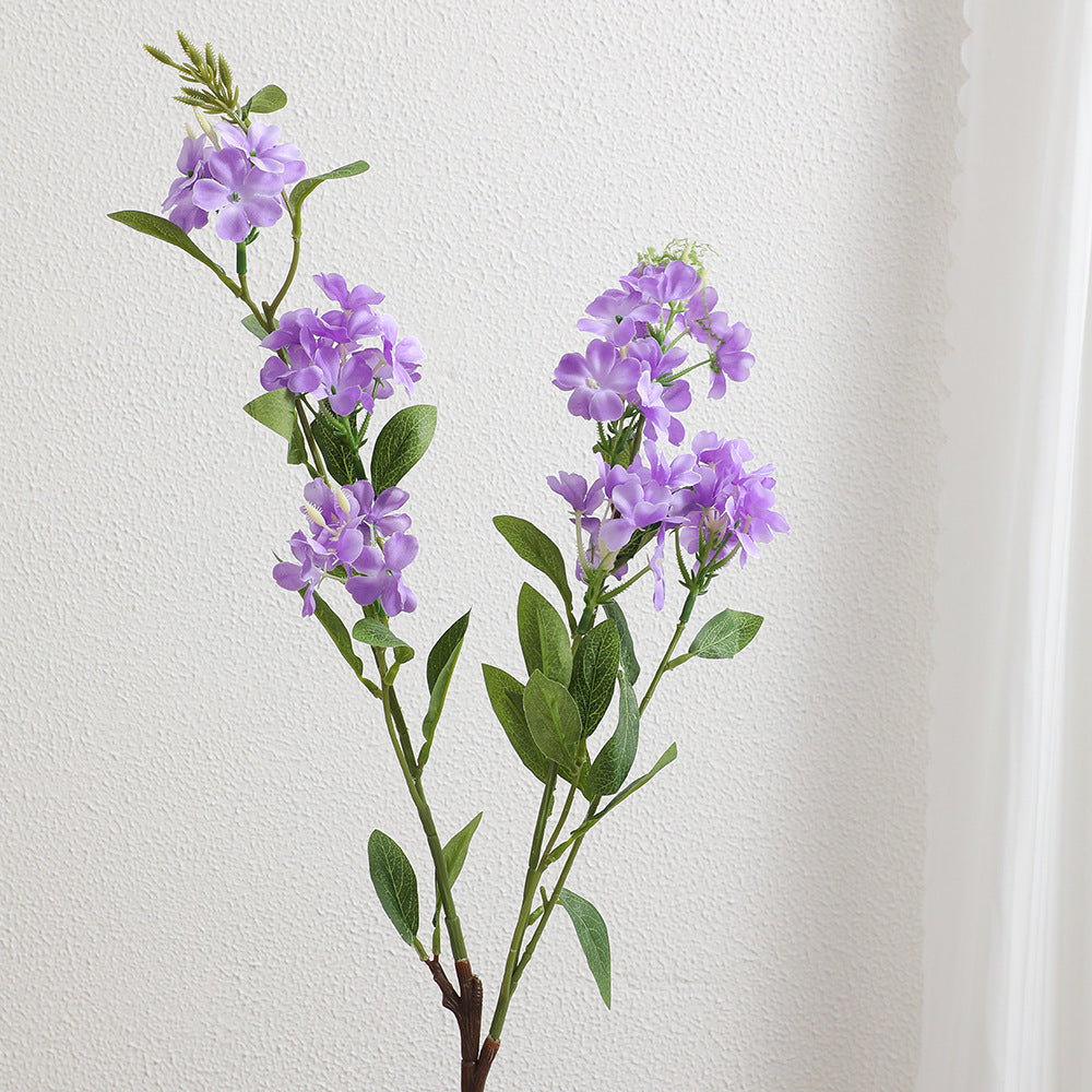 Decorative art branch with white flowers