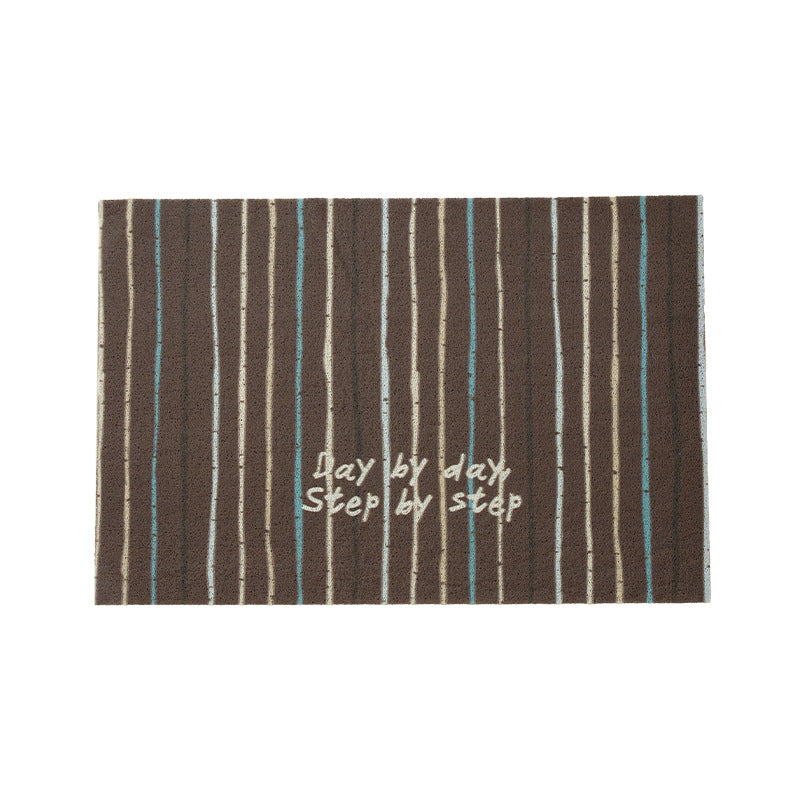 Woven door mat with welcome inscription, striped pattern and non-slip back