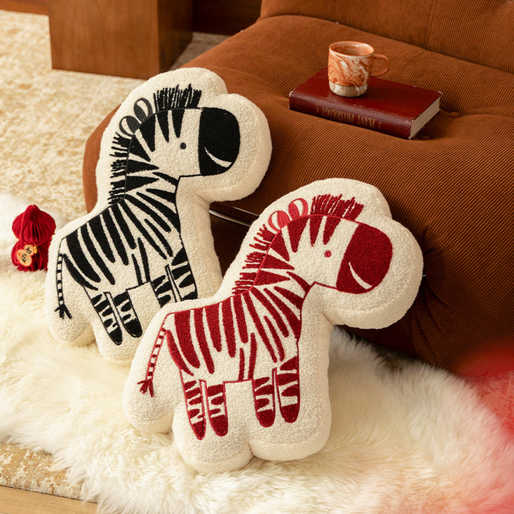Shaped children's room decorative pillow made of teddy fleece with embroidered zebra motif and contoured silhouette