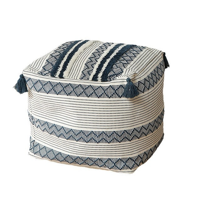 Braided square floor seat pouf with tassels and woven ethnic pattern