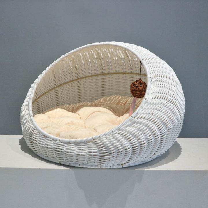 Cozy cat bed made of woven natural material
