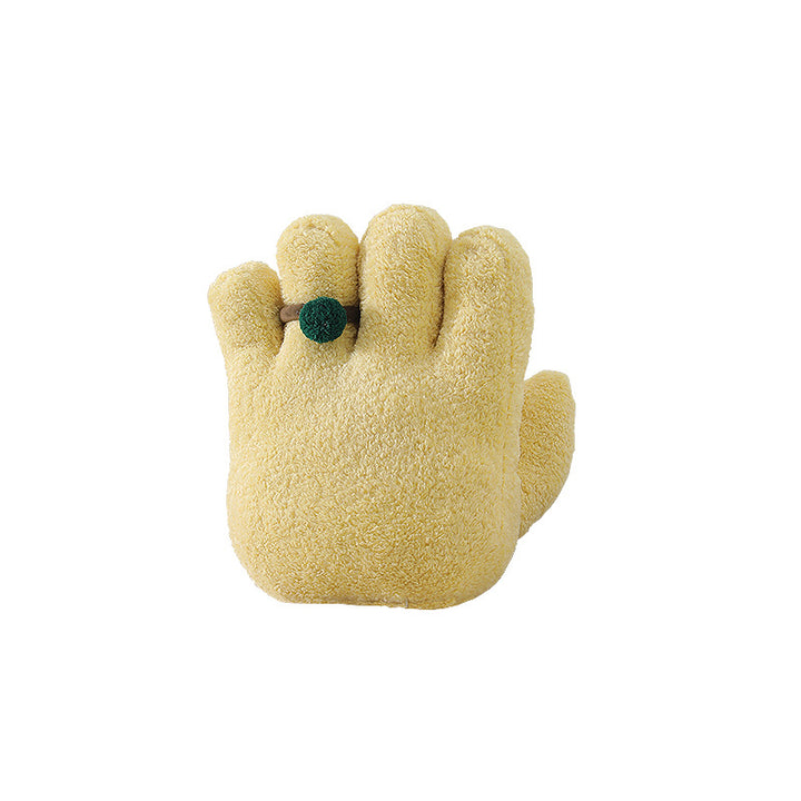 Plush decorative pillow in hand shape with pompon application