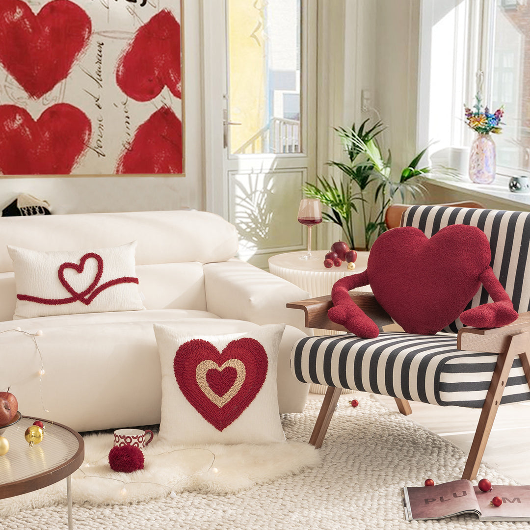 Heart-shaped cuddle cushion with extended arm applications