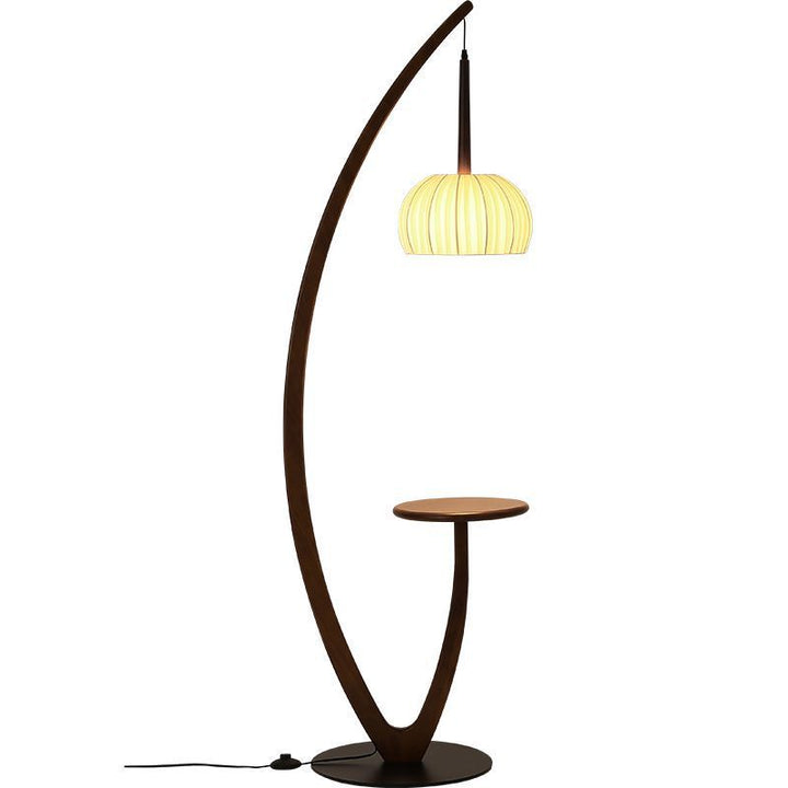 Artistic curved floor lamp with integrated side table