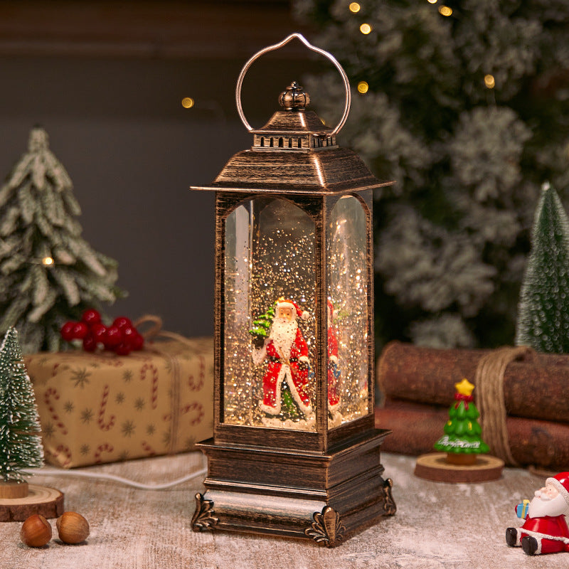 Illuminated Christmas lantern with snow and Christmas motif