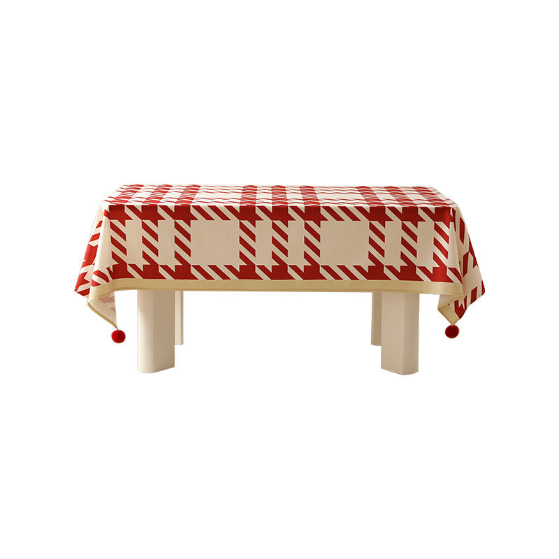 Rectangle wipeable tablecloth with diagonal checkered design and tassels