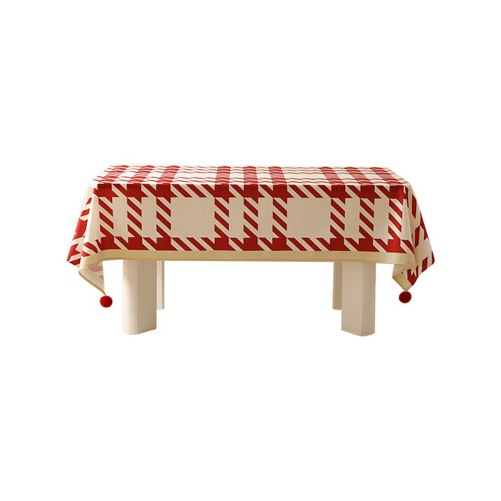 Rectangle wipeable tablecloth with diagonal checkered design and tassels