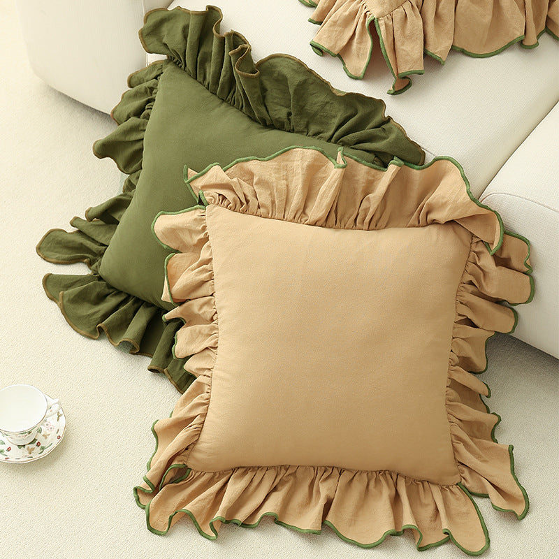 Romantic decorative cushion with gathered ruffles and linen look