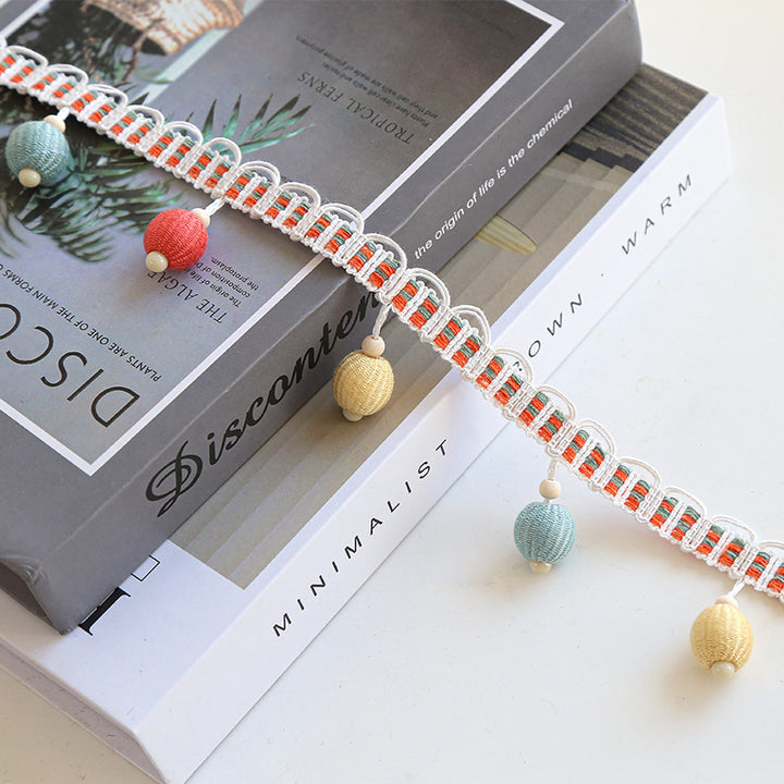 Decorative fringe trim with colorful tassels