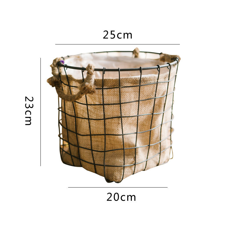 Decorative storage basket made of wire and linen