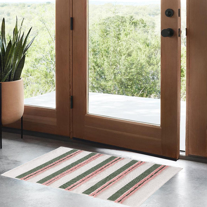 Cotton bath mat with textured stripes and fringes