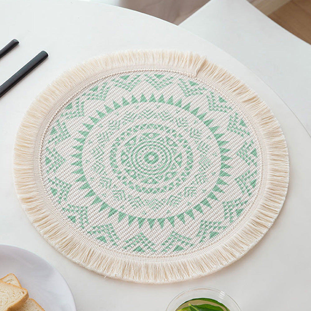 Round woven placemat with fringes and mandala jacquard structure