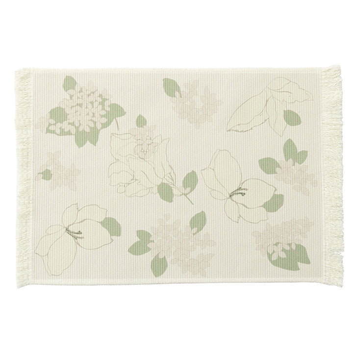 Floral woven bath mat with decorative fringes