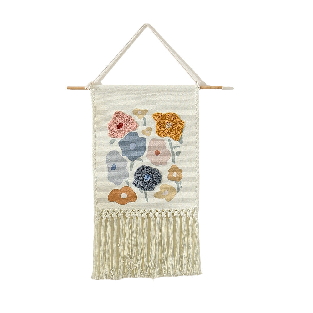 Woven cotton wall hanging with punch needle flower relief and fringes