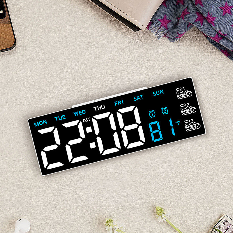 Digital LED desk clock with temperature and day of the week display
