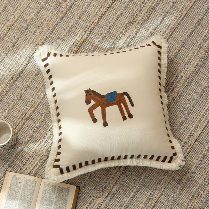 Decorative cushion cover made of cotton blend with fringes, check pattern and embroidered house