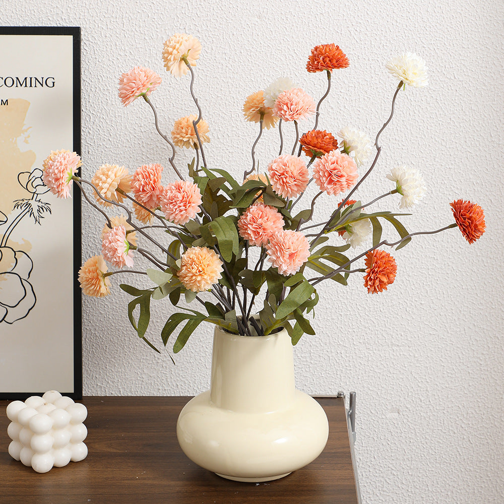 Artificial flower branch with intricate flowers