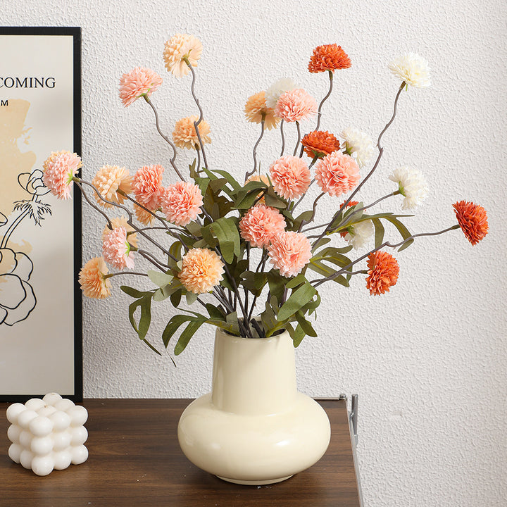 Artificial flower branch with intricate flowers