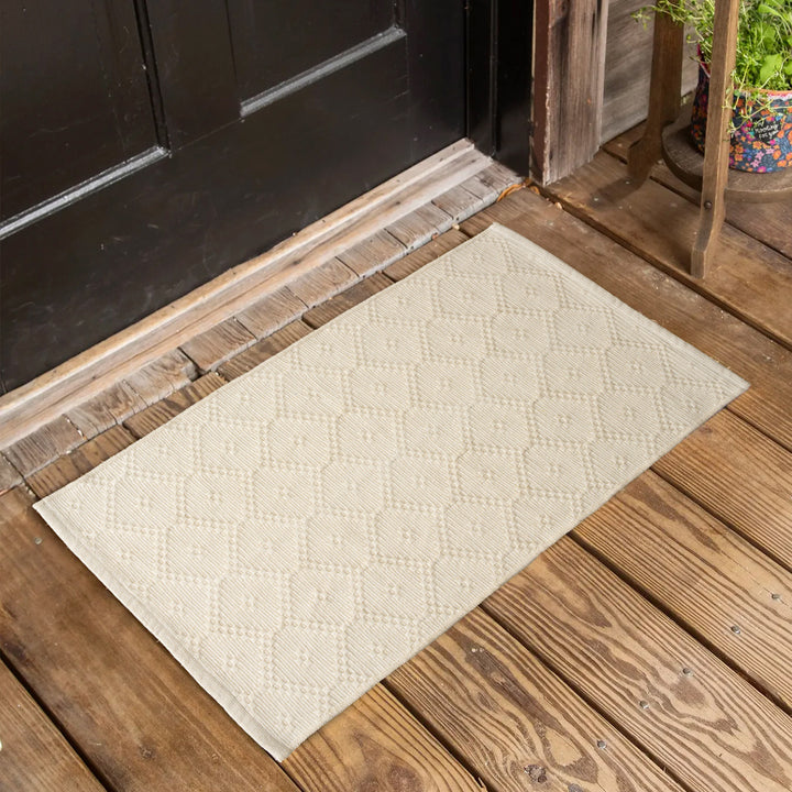 Woven square placemat with embossed diamond pattern