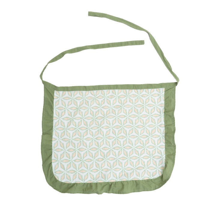 Waist apron with ruffles and woven geometric pattern
