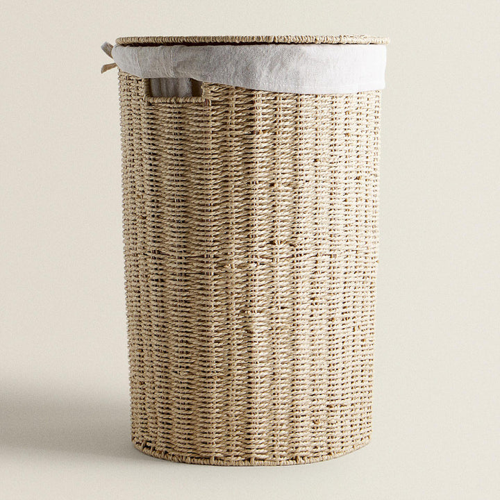 Round laundry basket made of natural materials