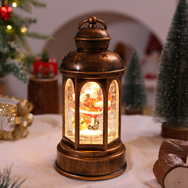Illuminated Christmas lantern with Santa Claus scene