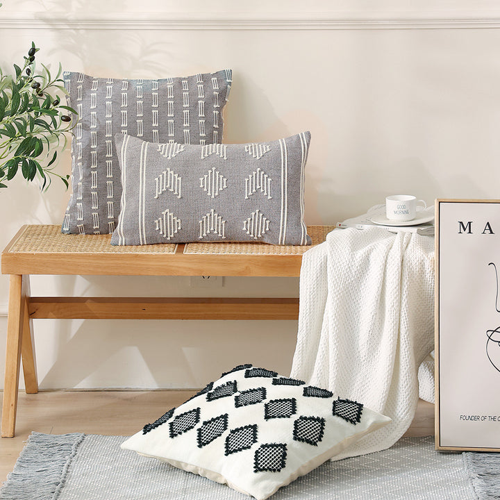 Woven decorative cushion cover with hand-tufted geometric pattern