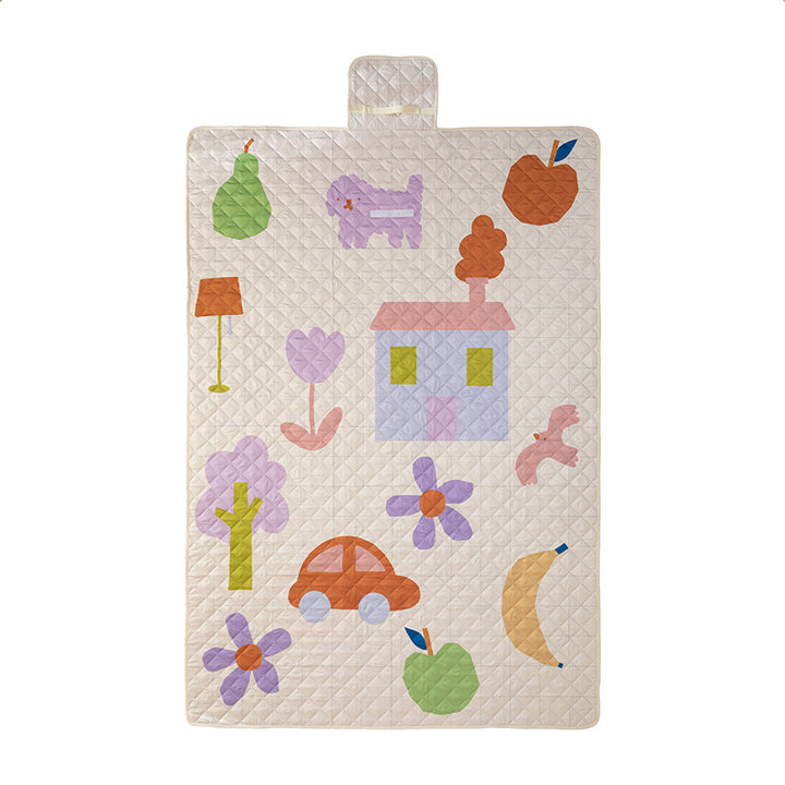 Padded outdoor picnic blanket with quilting, carrying flap and lightweight water-repellent cover