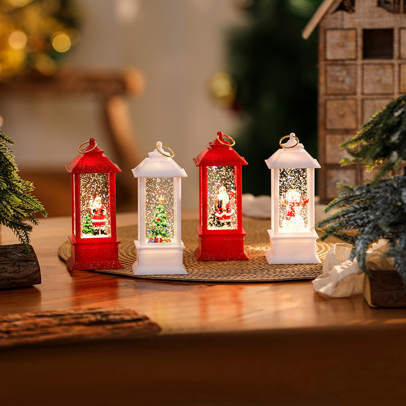 Illuminated Christmas lantern with glittering snowman scene