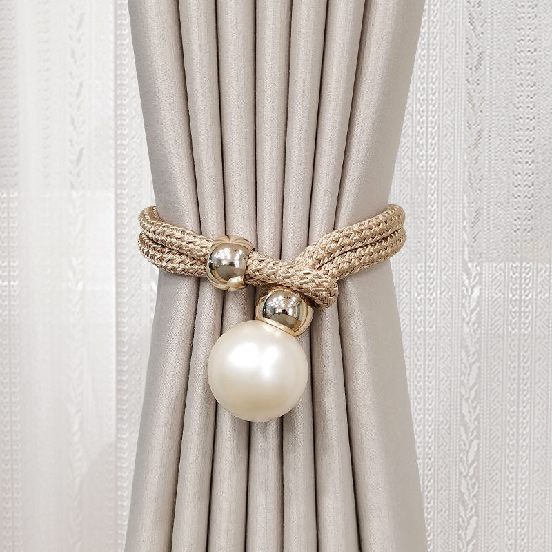 Elegant curtain tieback with decorative pearl