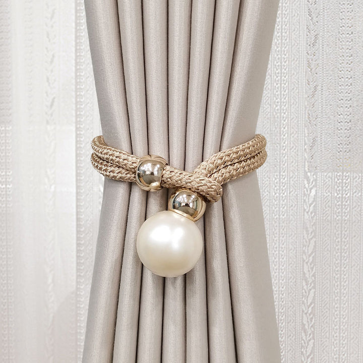 Elegant curtain tieback with decorative pearl