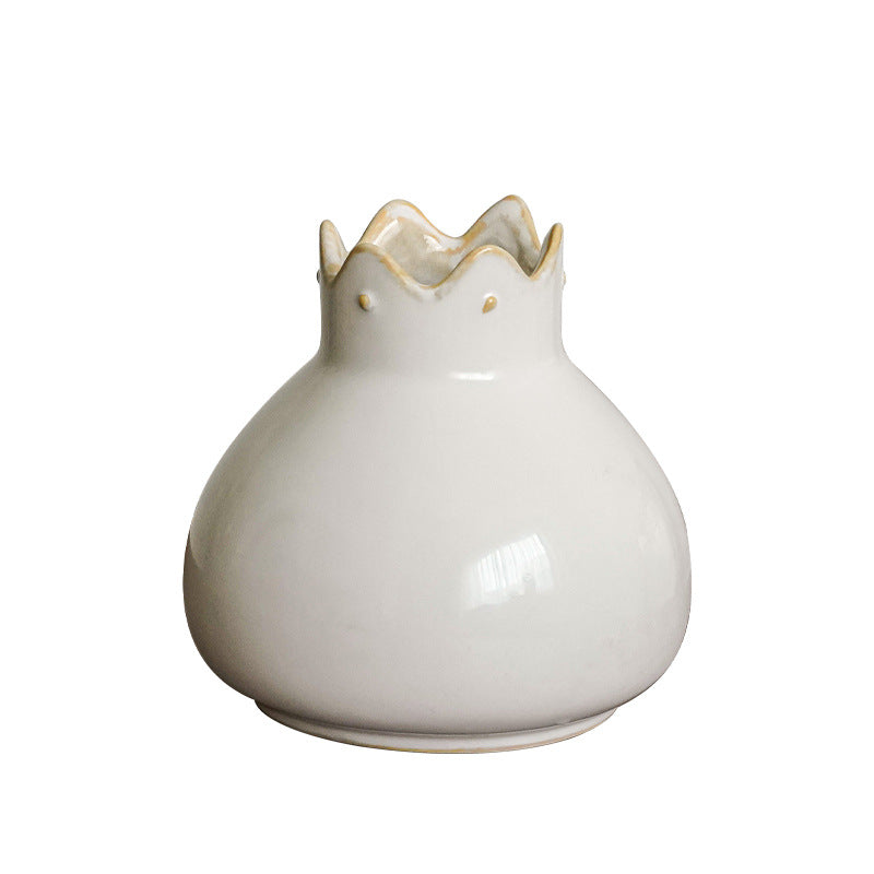 Elegant ceramic vase with wavy edge