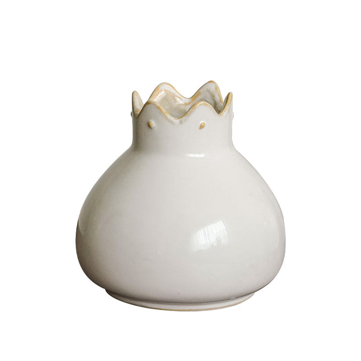Elegant ceramic vase with wavy edge
