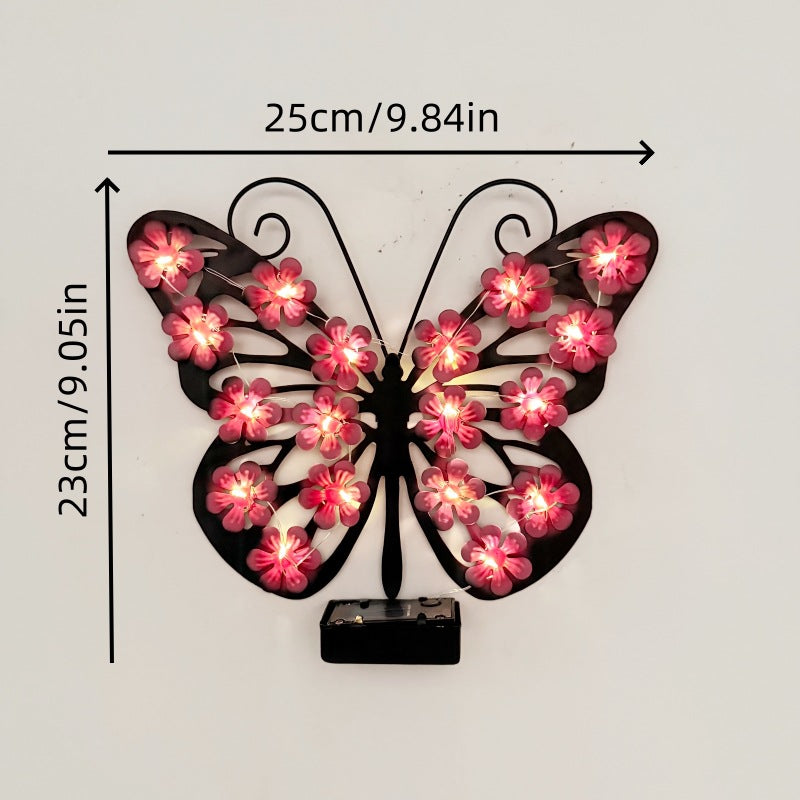 Decorative metal butterfly wall lamp with solar-powered flower LED string