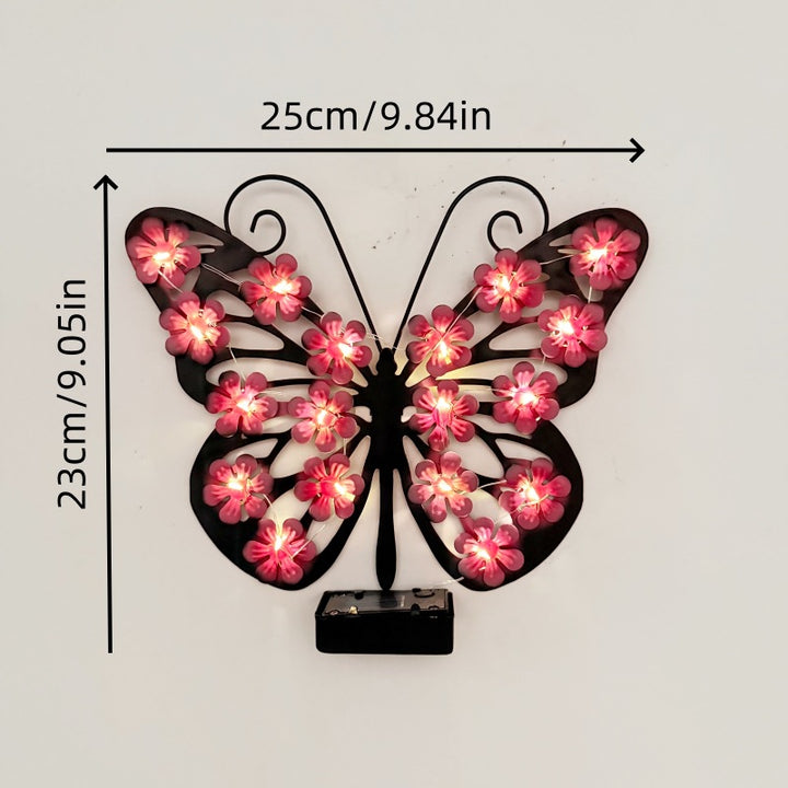 Decorative metal butterfly wall lamp with solar-powered flower LED string