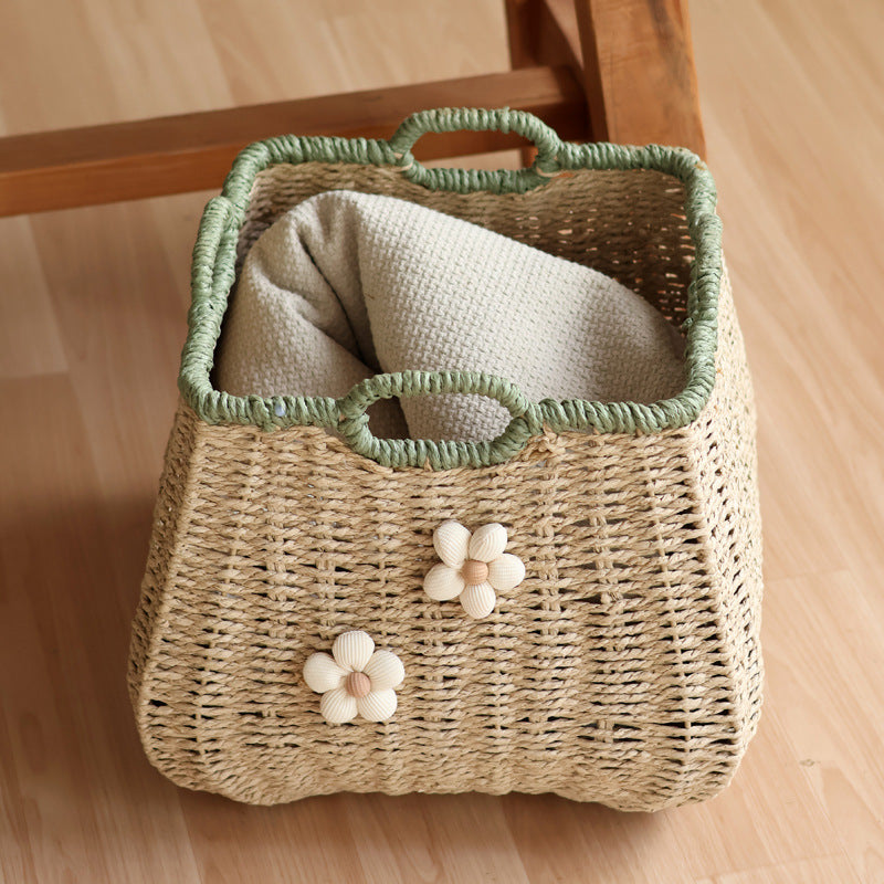 Stylish storage basket with flower appliqué