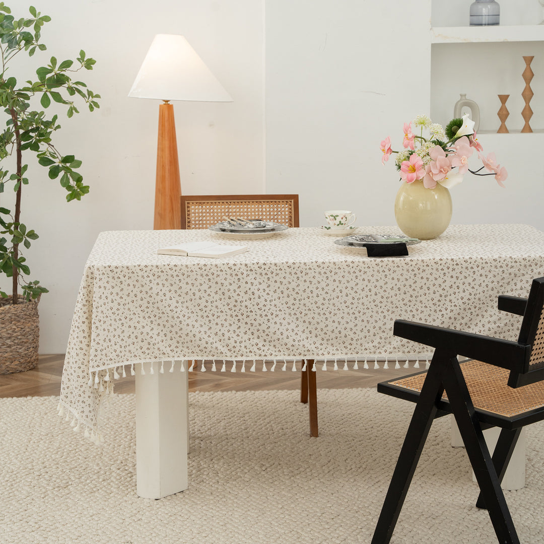 Rectangular tablecloth with floral Millefleurs print and cotton tassels