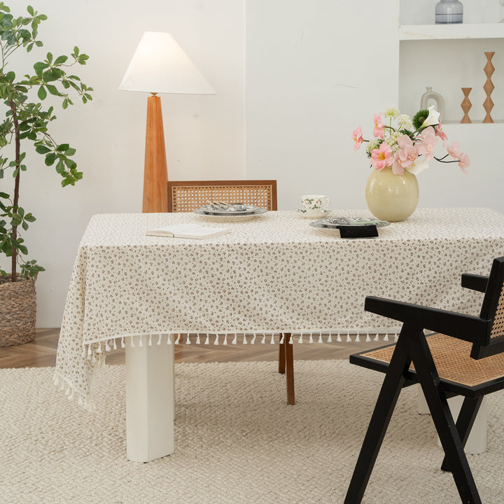 Rectangular tablecloth with floral Millefleurs print and cotton tassels