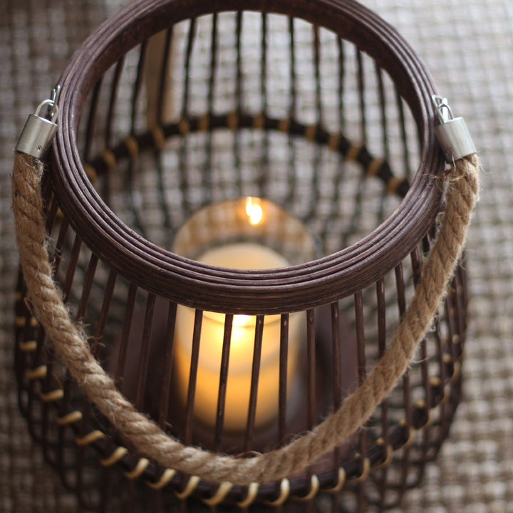 Stylish lantern made of rattan with wooden frame