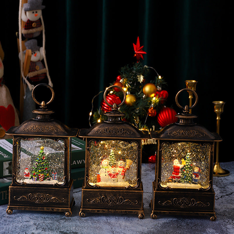 Glittering Christmas lantern with snow scenes