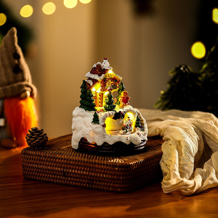 Illuminated Christmas village scene with winter design