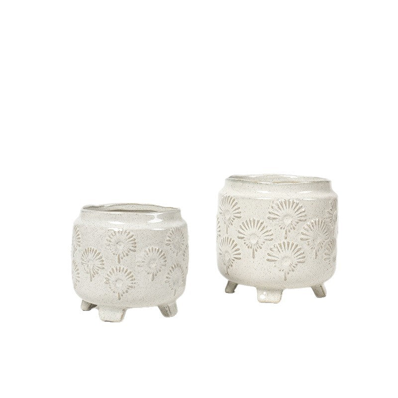 Decorative ceramic flower pot on legs