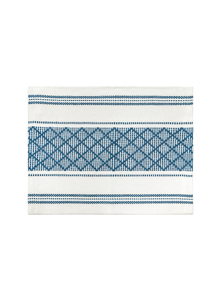 Flat woven placemat with woven diamond jacquard pattern