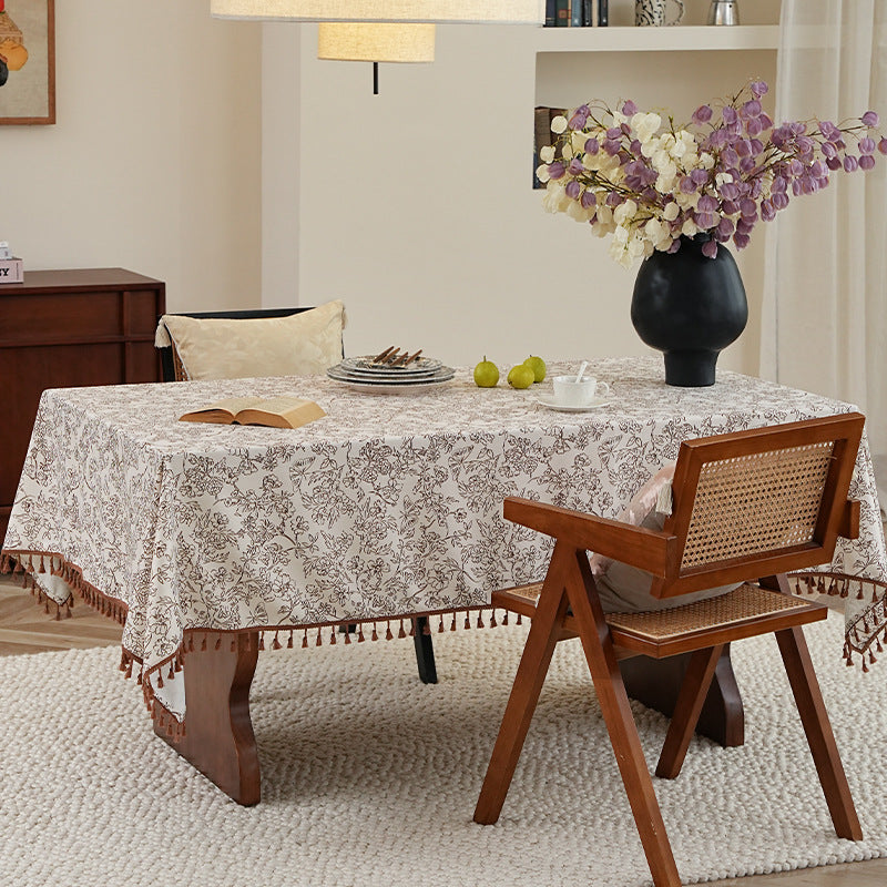Tablecloth made of cotton blend fabric with floral jacquard look and tassel trim