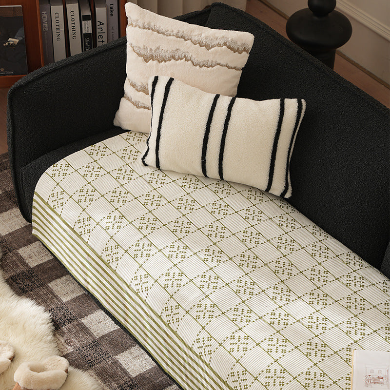 Woven rectangular table runner made of cotton blend with checkered pattern and striped border