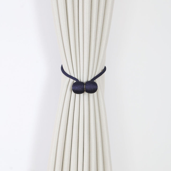 Decorative curtain tieback