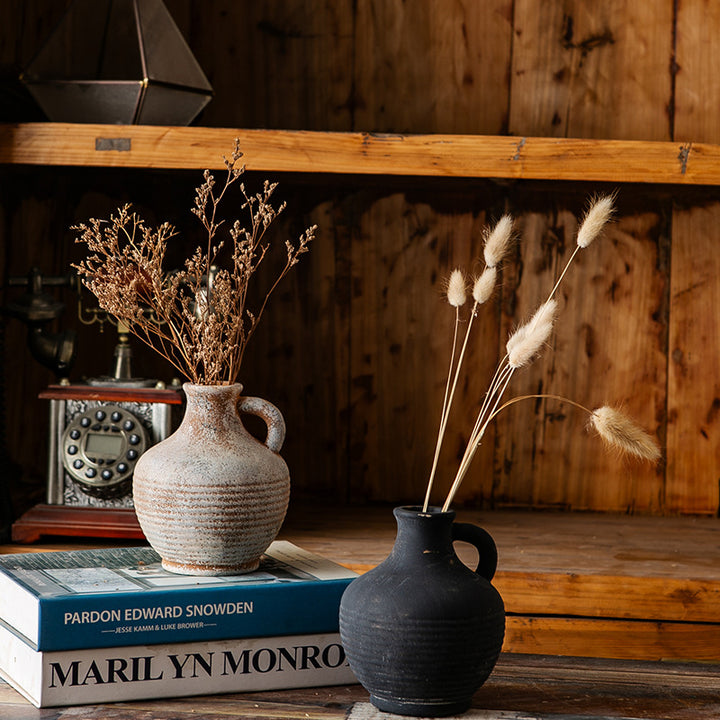 Rustic ceramic vase with handles