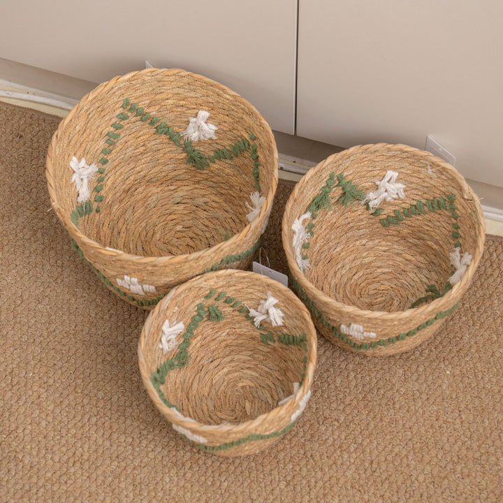 Handwoven storage basket with colorful accents
