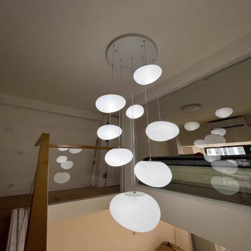 Modern multi-level LED pendant light with satin oval disc shades
