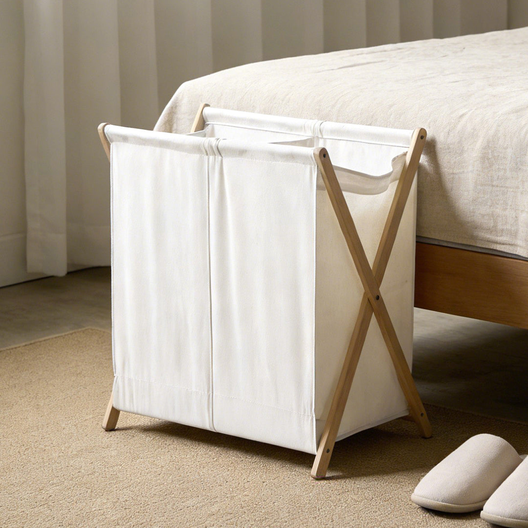 Modern laundry basket with folding frame